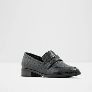 Black croc patent leather loafers.
